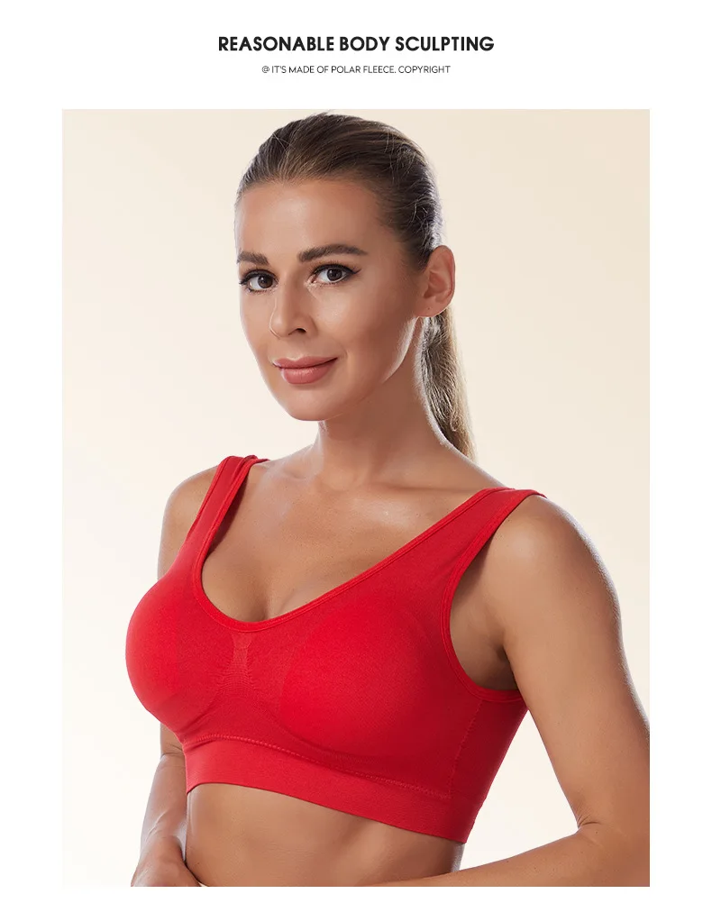 Plus size wireless sports bra with wide straps, full coverage, and breathable fabric, designed for high-impact support in workouts and everyday wear.