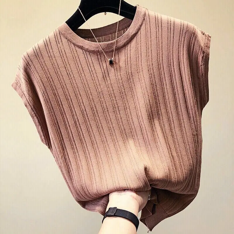 Women’s summer casual t-shirt in solid color with short sleeves, O-neck, and loose knitted fit—ideal for daily wear, layering, and warm weather comfort.