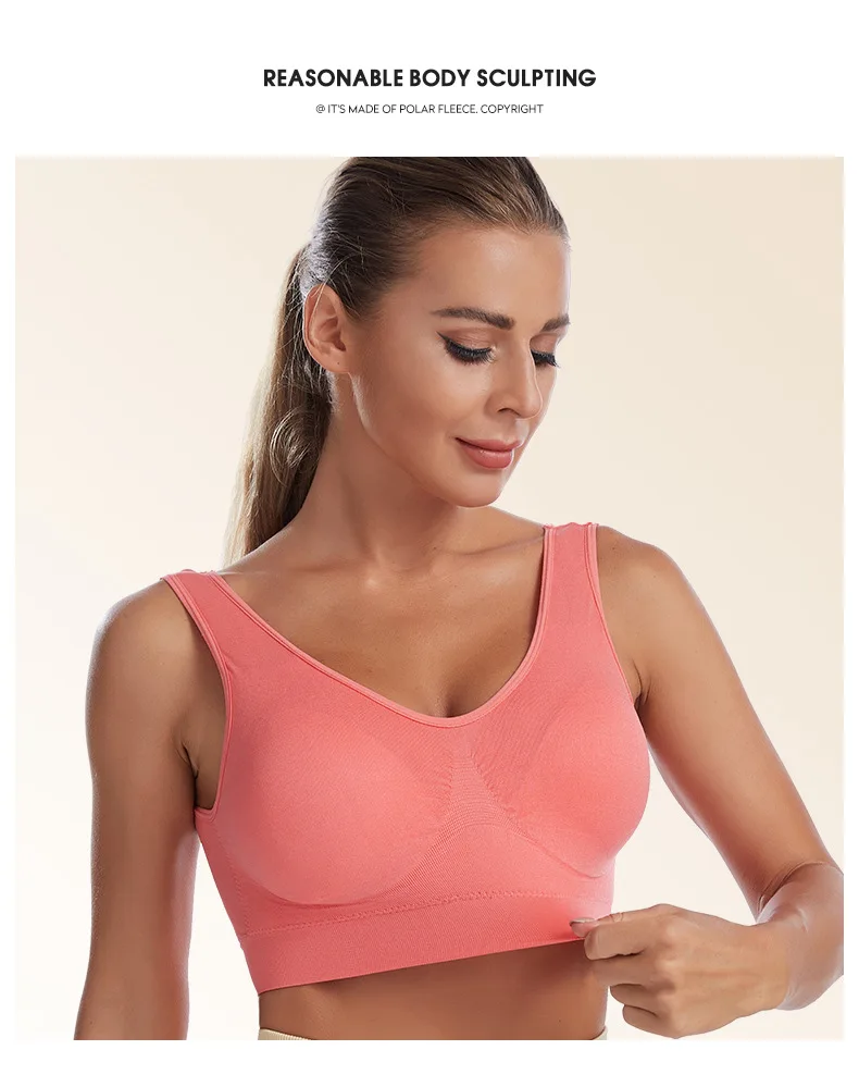 Plus size wireless sports bra with wide straps, full coverage, and breathable fabric, designed for high-impact support in workouts and everyday wear.