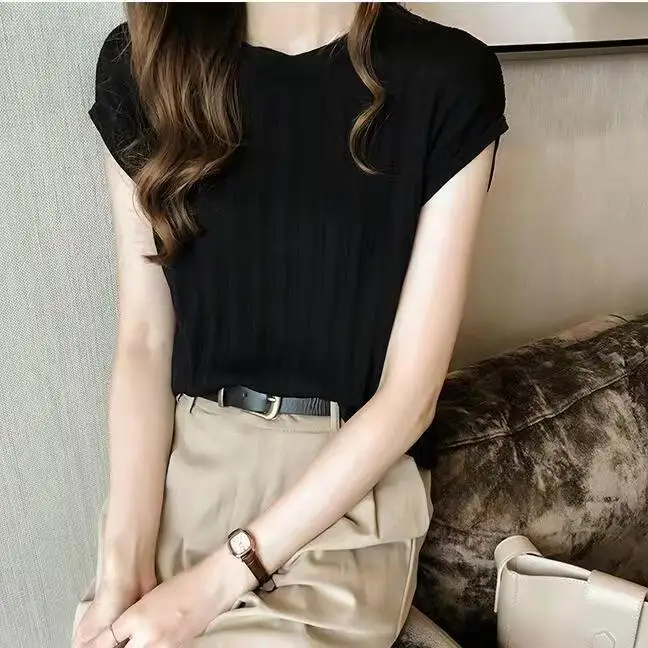 Women’s summer casual t-shirt in solid color with short sleeves, O-neck, and loose knitted fit—ideal for daily wear, layering, and warm weather comfort.